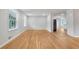 Bright living room showcasing beautiful hardwood floors and abundant natural light from large windows at 4647 Wonder Valley Trl, Decatur, GA 30034