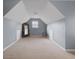 Bright bedroom showcases neutral carpet and walls, and a unique ceiling feature at 504 Trotters Ln, Mcdonough, GA 30252