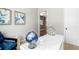 Cozy office features a stylish desk and comfortable chair at 104 Cedar Brook Dr, Holly Springs, GA 30115