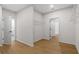 Spacious walk-in closet with wood floor and wire shelving for optimal storage at 1693 Juniper Berry Way, Loganville, GA 30052