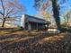 Exterior view from the backyard of this split level home with a spacious deck at 1032 Brian Ln, Forest Park, GA 30297