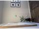Light-filled entryway featuring artwork, modern decor, and wood-look flooring at 11563 Kimberly Way # 23, Hampton, GA 30228