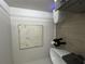 Bathroom featuring neutral tile, modern fixtures, and a contemporary toilet with blue lights at 11565 Kimberly Way # 24, Hampton, GA 30228