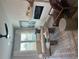Bright living room featuring neutral tones, modern fireplace, and stylish decor at 11565 Kimberly Way # 24, Hampton, GA 30228