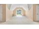 Bedroom featuring light walls, carpet and window at 4484 Hunters Way, Stone Mountain, GA 30083