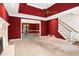 Bright living room with fireplace, staircase, and open layout at 4484 Hunters Way, Stone Mountain, GA 30083