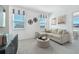 Bright bonus room with comfortable seating and stylish decor, perfect for relaxation at 604 Devon Aly, Acworth, GA 30102