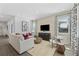 Comfortable living room with modern decor, plush seating, and natural light at 604 Devon Aly, Acworth, GA 30102