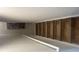 Stairway with neutral carpet and white railing provides safe access to the home's upper level at 11559 Kimberly Way # 21, Hampton, GA 30228