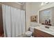 Functional bathroom with a shower/tub combo, neutral tones, and a vanity with a sink, providing essential amenities at 2088 Skybrooke Ct, Hoschton, GA 30548