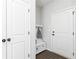 Entryway with coat hooks, a bench, and storage, with tile flooring at 3034 Cambridge Ml, Acworth, GA 30102