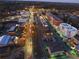 Aerial view of lit-up downtown streets at 318 Lantana Ln, Woodstock, GA 30188