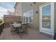 Outdoor deck featuring dining table and seating, perfect for relaxing or entertaining with an exterior door at 318 Lantana Ln, Woodstock, GA 30188