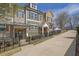 Charming townhomes featuring diverse exteriors and gated front yards at 318 Lantana Ln, Woodstock, GA 30188