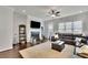 Living area with hardwood floors features a fireplace and modern furniture at 318 Lantana Ln, Woodstock, GA 30188