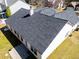 House with a gray roof and small patio at 3412 Hard Creek Ln, Buford, GA 30519