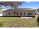 The backyard has a patio with several windows at 3412 Hard Creek Ln, Buford, GA 30519