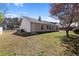Side yard view with a door leading to the backyard at 3412 Hard Creek Ln, Buford, GA 30519