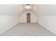 A bonus room with neutral carpet and walls with a door at 3412 Hard Creek Ln, Buford, GA 30519