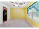 Sunny breakfast nook features carpeted floors and a large window with pleasant views at 3412 Hard Creek Ln, Buford, GA 30519