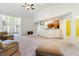 Open-concept living room with lots of natural light and breakfast bar at 3412 Hard Creek Ln, Buford, GA 30519