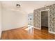 Bright and sunny bedroom with hardwood floors and access to an outdoor balcony at 375 Ralph Mcgill Ne Blvd # 804, Atlanta, GA 30312