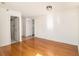 Bright living room with hardwood floors, fresh white paint, and an adjacent closet and kitchen at 375 Ralph Mcgill Ne Blvd # 804, Atlanta, GA 30312