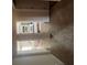 Hallway view of two bedrooms, revealing cozy interiors and inviting color schemes for a comfortable home atmosphere at 11555 Kimberly Way # 19, Hampton, GA 30228