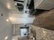 Modern kitchen with granite countertops, stainless steel appliances, and ample cabinet space at 11555 Kimberly Way # 19, Hampton, GA 30228