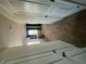 Bright living room with large windows for natural light and a high ceiling at 11555 Kimberly Way # 19, Hampton, GA 30228
