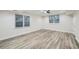 Finished basement with two windows and neutral walls at 1555 Sunnybrook Farm Rd, Atlanta, GA 30350