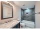 Bathroom featuring modern fixtures, vanity, and tub with tiled shower at 1555 Sunnybrook Farm Rd, Atlanta, GA 30350