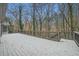 Expansive deck perfect for outdoor entertaining with view of the trees at 1555 Sunnybrook Farm Rd, Atlanta, GA 30350