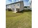 Backyard featuring lush lawn and patio at 2560 Quarterdeck Dr, Cumming, GA 30041