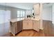 Bright kitchen with stainless steel dishwasher, white cabinets, and granite countertops at 2560 Quarterdeck Dr, Cumming, GA 30041
