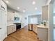 Kitchen features modern stainless steel appliances, subway tile backsplash, and white countertops at 2560 Quarterdeck Dr, Cumming, GA 30041