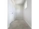 Walk-in closet with neutral walls and trim and plush carpeting at 2560 Quarterdeck Dr, Cumming, GA 30041