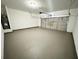 Spacious garage with epoxy flooring and insulated garage door at 6159 Sable Fox Dr, Riverdale, GA 30296
