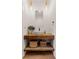 Modern powder room with wood floating vanity, vessel sink, and pendant lights at 289 2Nd St, Fayetteville, GA 30214