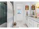 Contemporary bathroom with tiled shower, marble vanity, and stylish decor at 289 2Nd St, Fayetteville, GA 30214