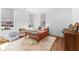Cozy bedroom with hardwood floors, ample natural light, a cheerful rug, and a stylish dresser at 289 2Nd St, Fayetteville, GA 30214