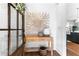 Chic entryway with wood floors, decorative artwork, and a glimpse into the kitchen at 289 2Nd St, Fayetteville, GA 30214