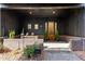 Charming front porch with a brick foundation, dark wood trim, and a decorative glass front door at 289 2Nd St, Fayetteville, GA 30214
