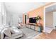Bright living room boasts large windows, modern furniture, and open layout at 289 2Nd St, Fayetteville, GA 30214