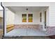 Exterior view of the back porch and yard at 1692 Juniper Berry Way, Loganville, GA 30052