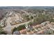 Aerial view with homes and trees, creating a scenic and desirable neighborhood setting at 2126 Roberts View Trl, Buford, GA 30519