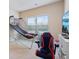 Bedroom with basketball game, gaming chair, and built-in shelves for organized living at 2126 Roberts View Trl, Buford, GA 30519