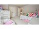 Comfortable bedroom with neutral colors, filled with personal touches, creating a cozy space at 2126 Roberts View Trl, Buford, GA 30519