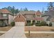 Beautiful two-story brick home featuring manicured landscaping and an attached two-car garage at 2126 Roberts View Trl, Buford, GA 30519