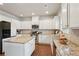 Bright, modern kitchen featuring granite countertops, stainless steel appliances, and ample cabinet space at 2126 Roberts View Trl, Buford, GA 30519